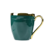 Tasse verte en céramique de cadeau de Noël avec la jante d'or